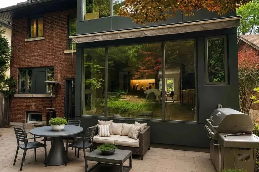 Rear extension on a Toronto home after construction, opening the back of the house into the yard