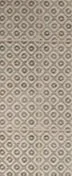 Close-up of a textured fabric with geometric diamond pattern in neutral tones.