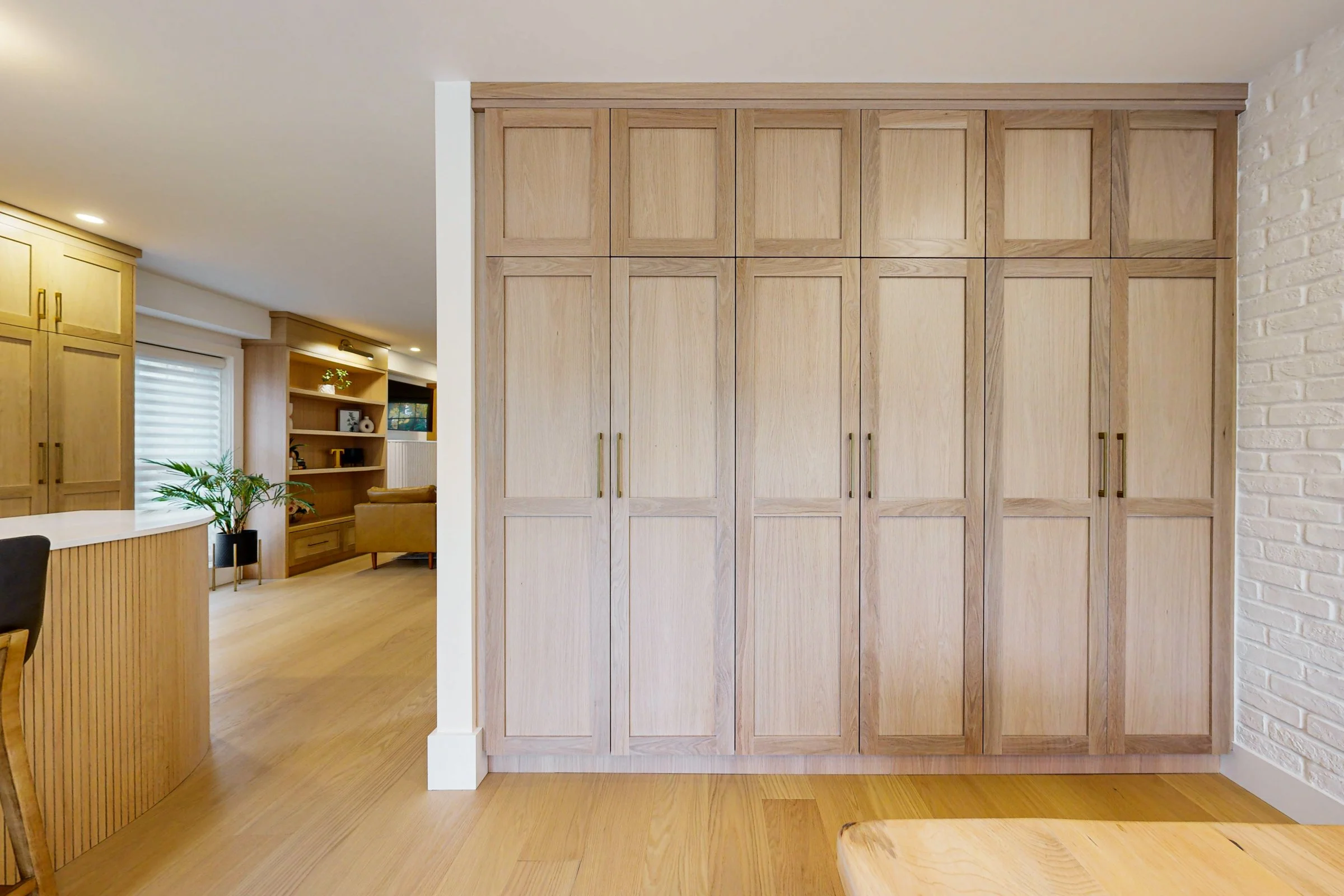 Open-concept main floor reconfiguration in an Etobicoke home.