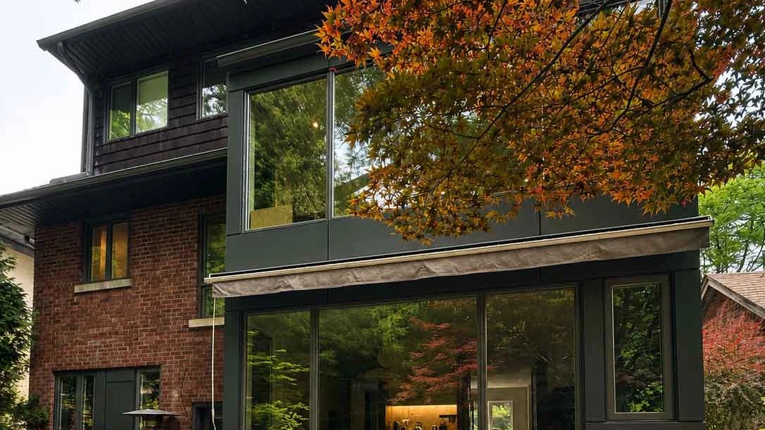 The finished two-storey glazed addition on the rear of the same house, Quiet Oasis project.