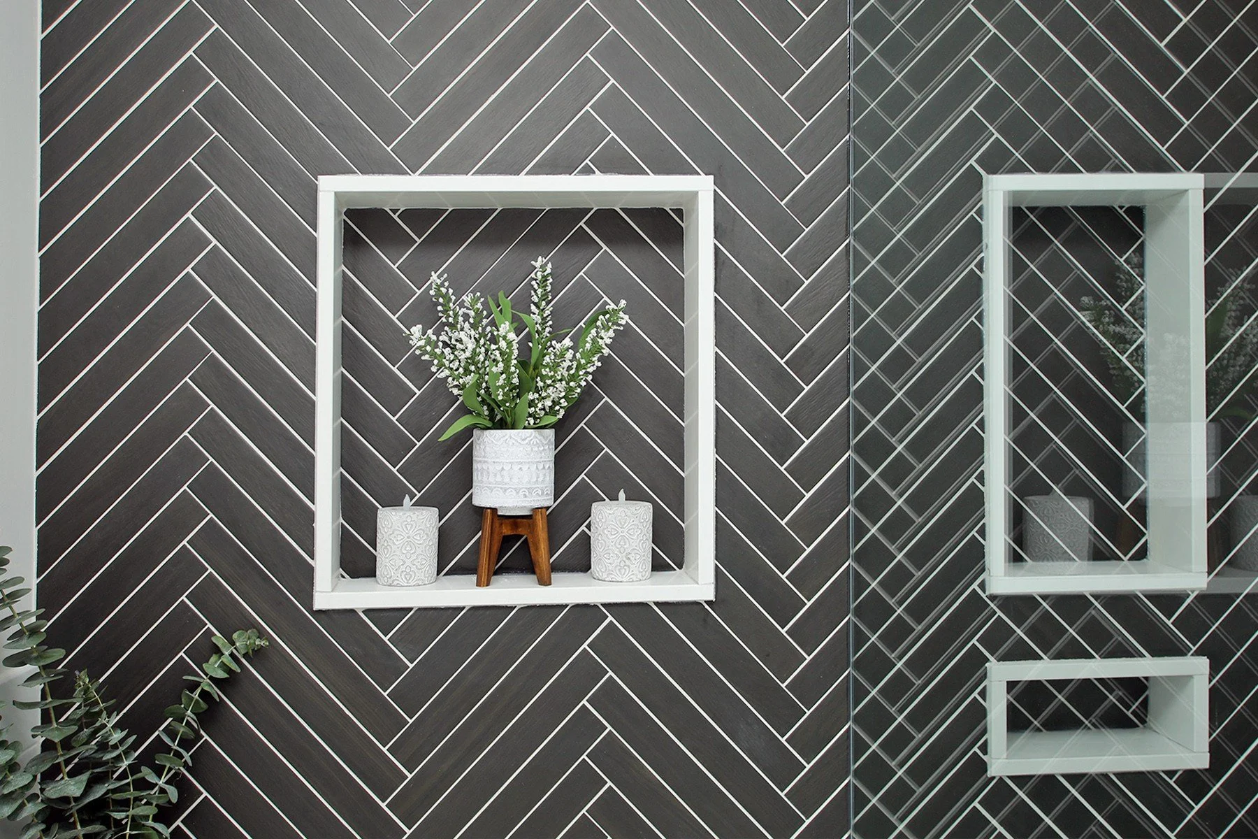 Recessed display niche in dark herringbone wall tile, Timeless Elegance project