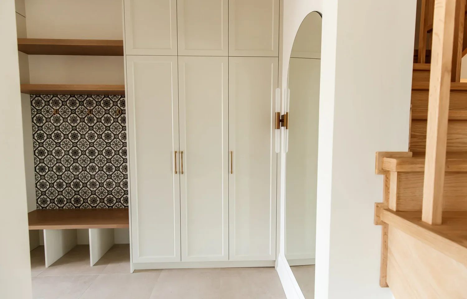 Completed Waterfront custom home interior with warm millwork and natural light.